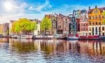 Amsterdam,Netherlands,Dancing,Houses,Over,River,Amstel,Landmark,In,Old